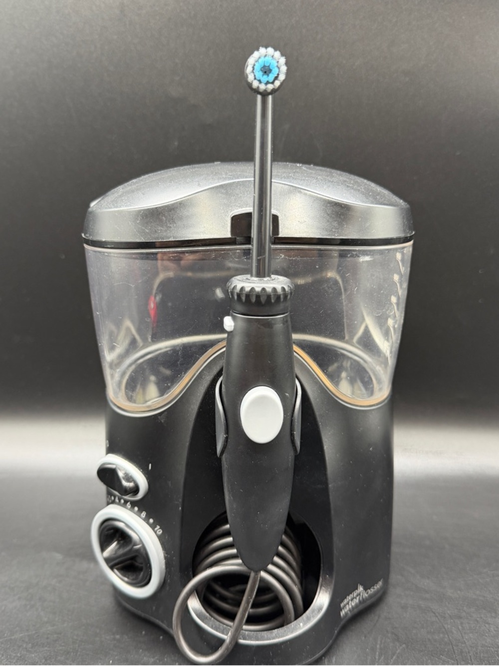 Waterpik Water Flosser Black WP-112W Oral Irrigator Multiple Tips Tested 20 Oz